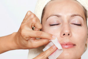 woman receiving a lip wax service