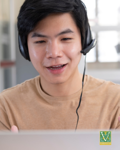 virtual consult with young man wearing headphones